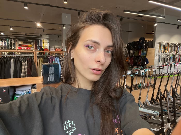 Woman takes selfies in Krasnoyarsk sports store