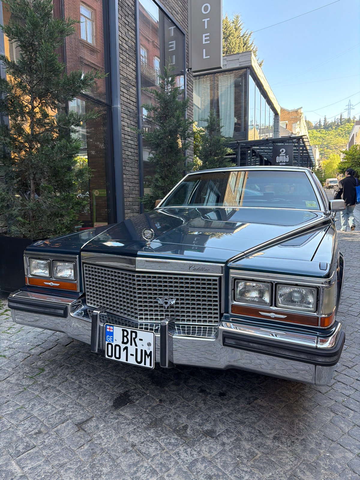 Blue Cadillac spotted near Saint George statue in Tbilisi