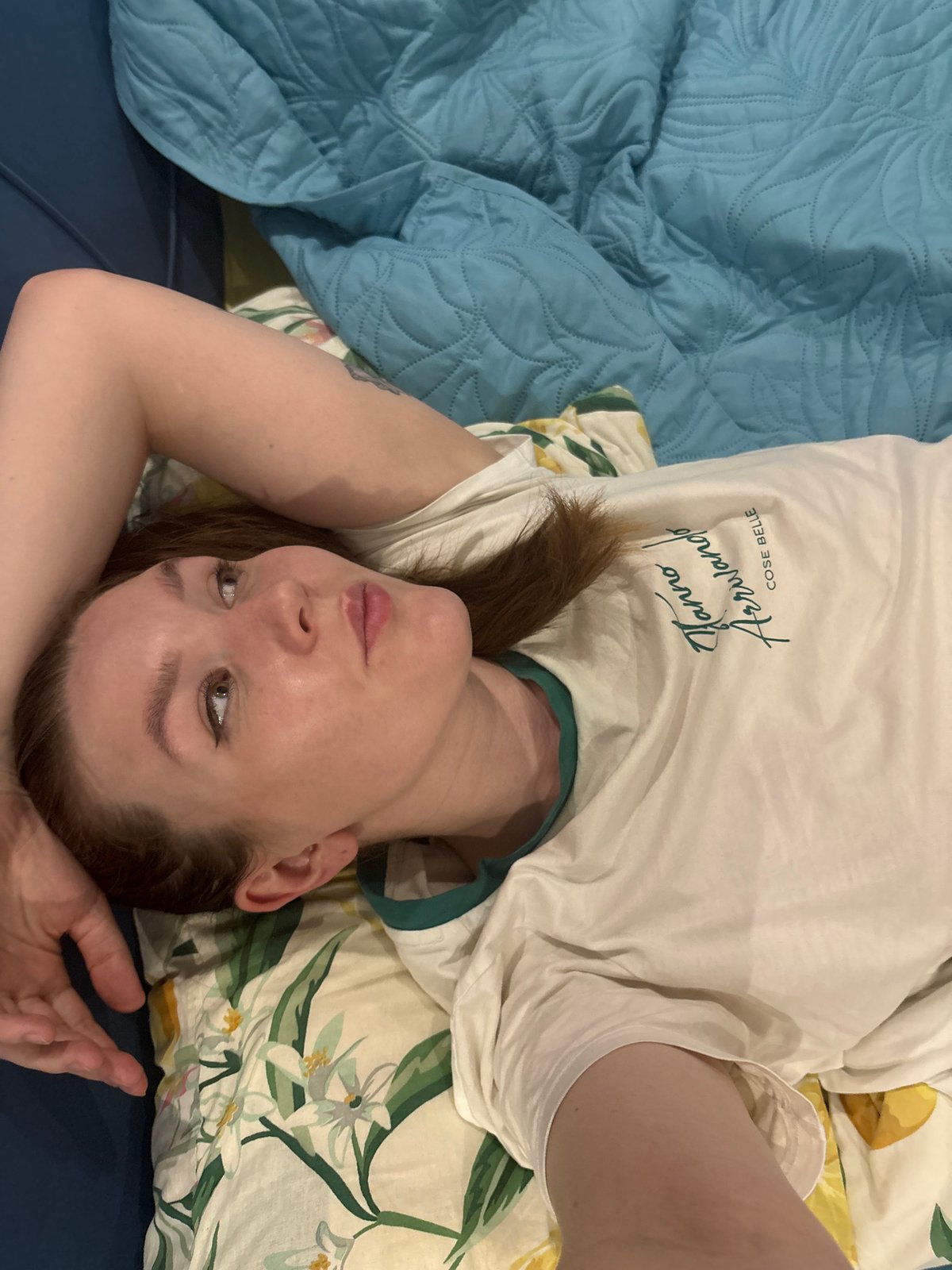 Woman and kitten share quiet domestic moments in Izhevsk bedroom