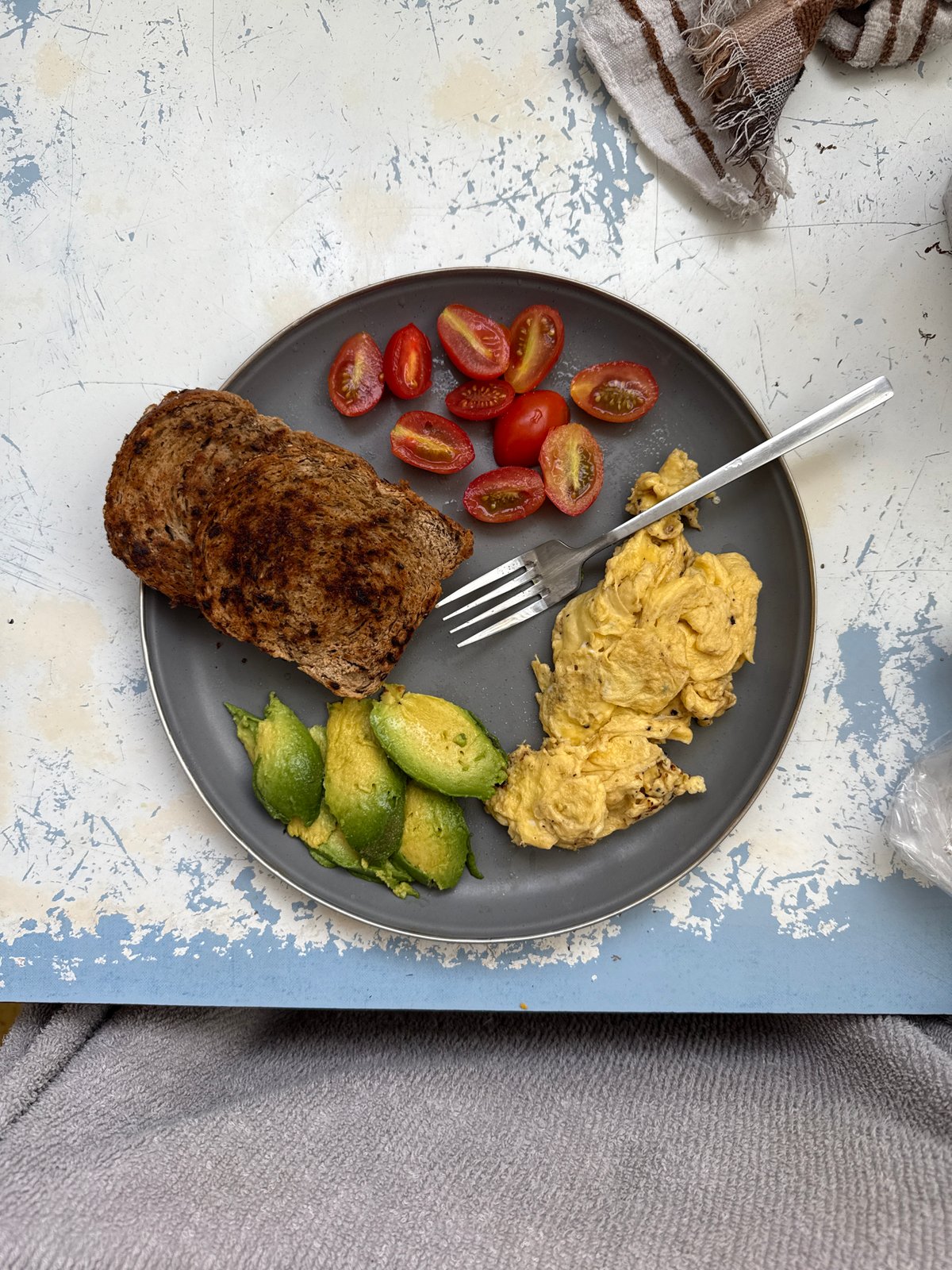 Breakfast plate documented in Buenos Aires featuring eggs and avocado