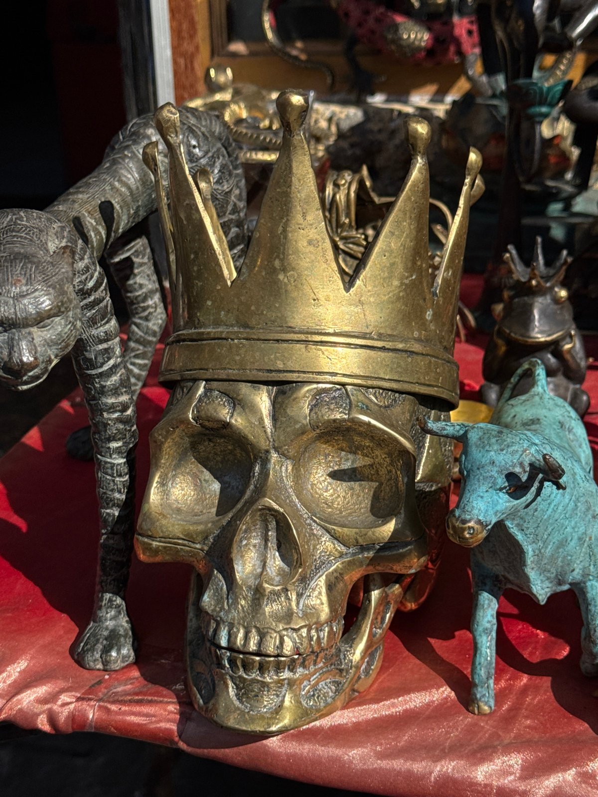 Ceremonial artifacts and festive umbrellas at a Ubud gathering