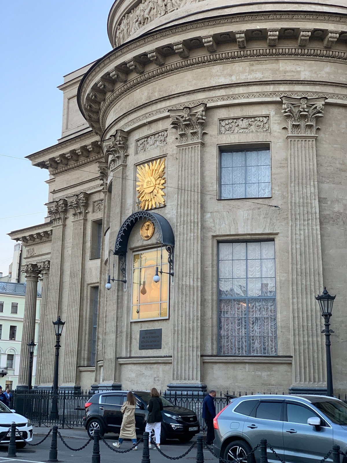 Tourist documents Saint Petersburg cathedral architecture during evening walk