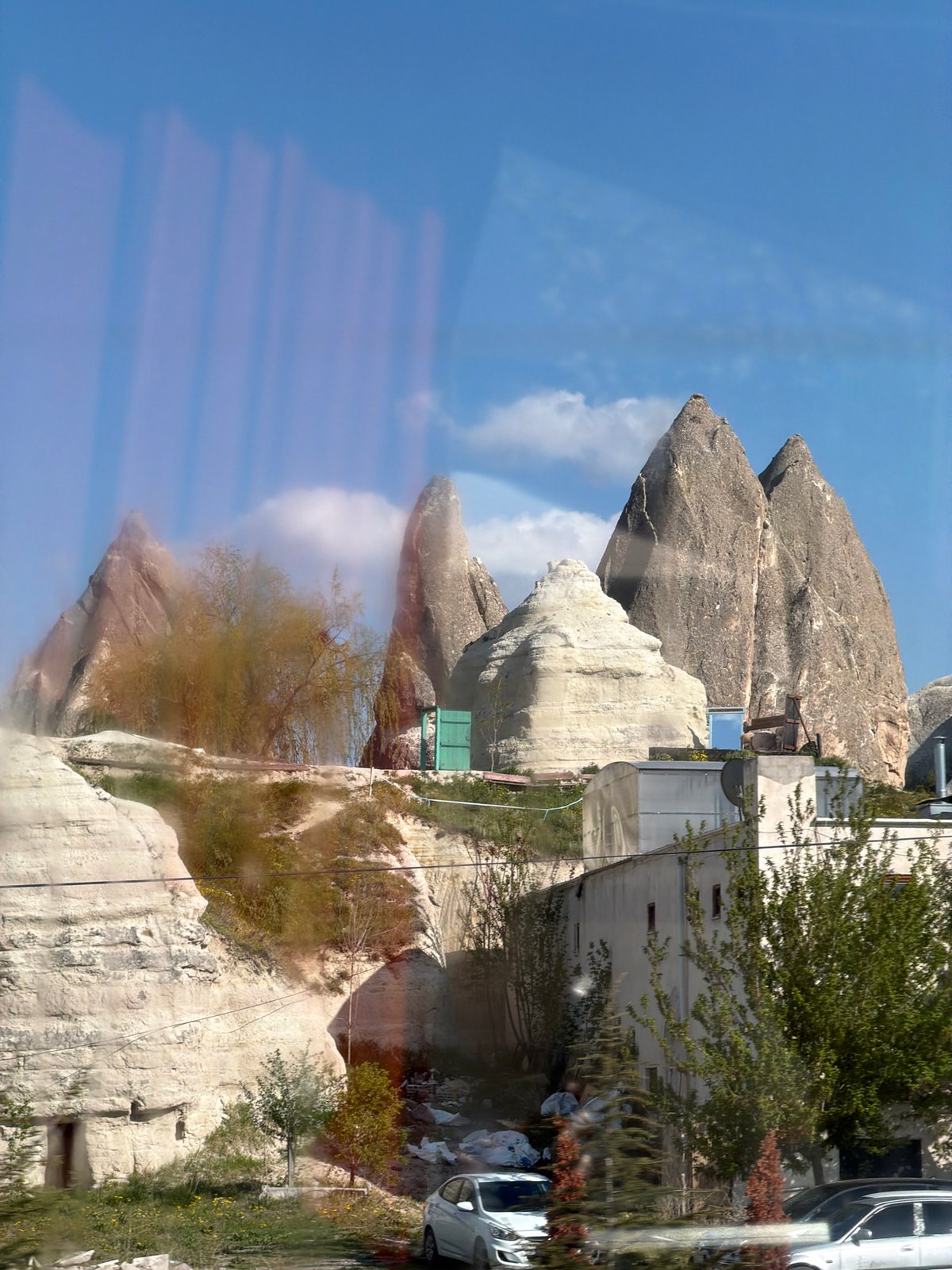 Tourist photographs capture Cappadocia's fairy chimneys, abandoned car