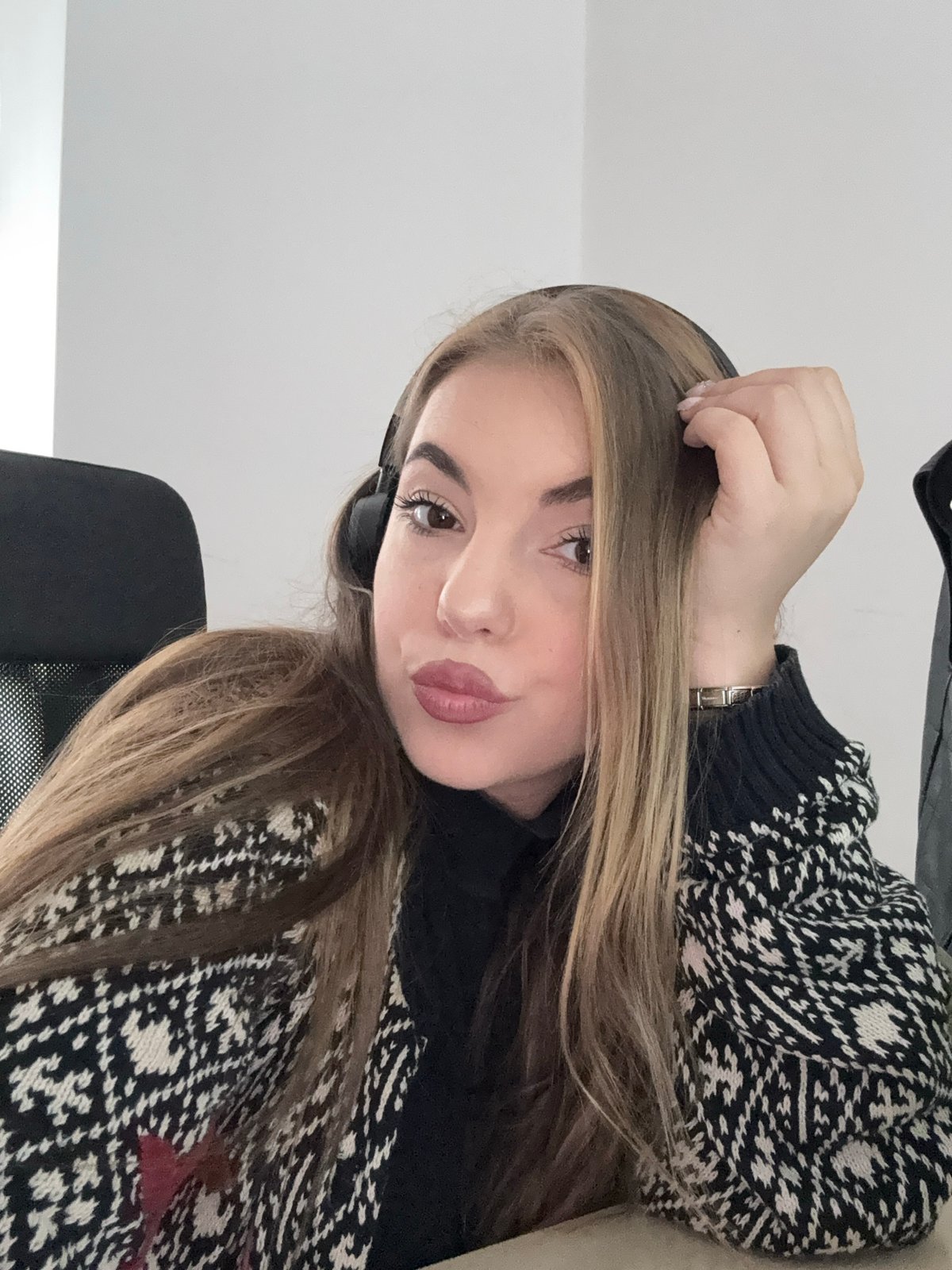 Office worker captured at dual-monitor desk setup in Sofia