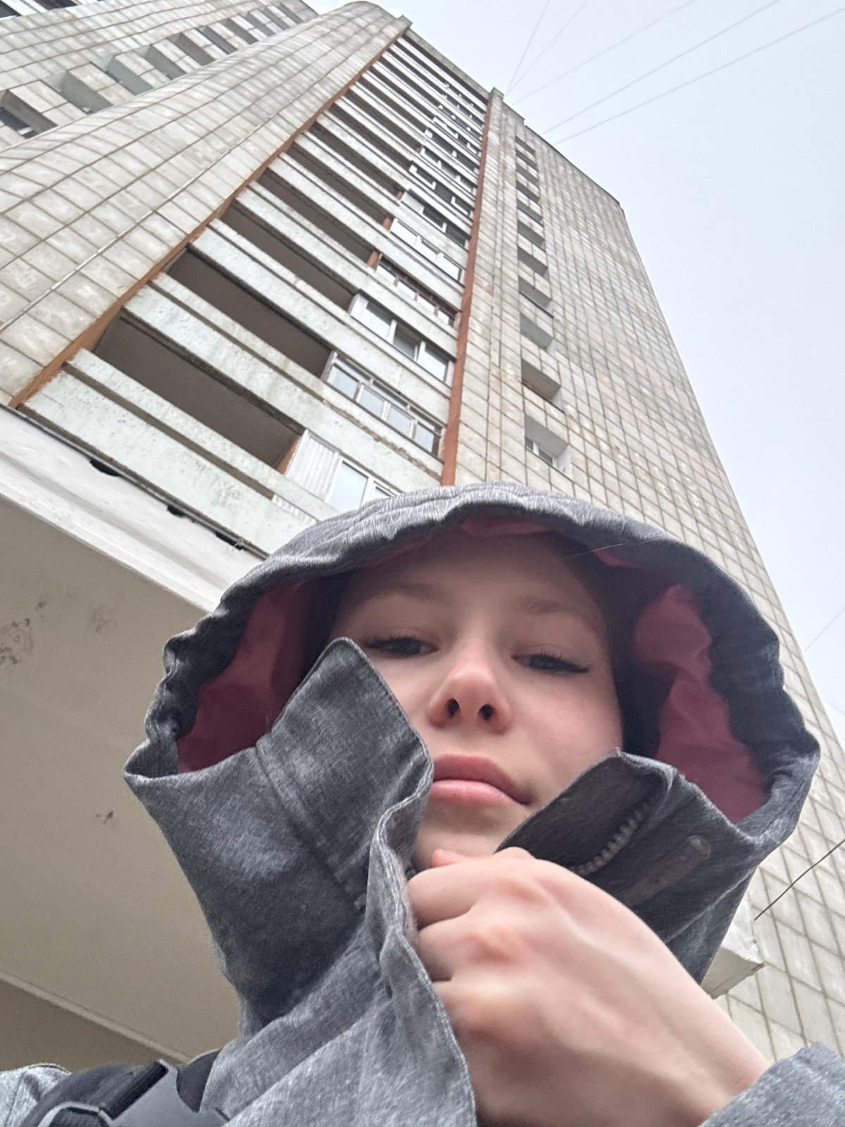 Young woman photographed taking selfies across Chaikovsky locations