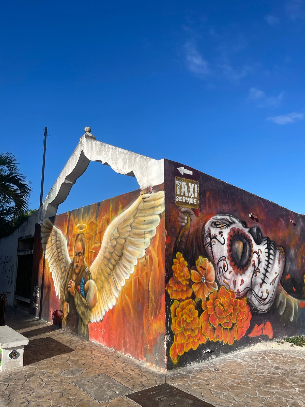 Sugar skull mural documented in Playa del Carmen