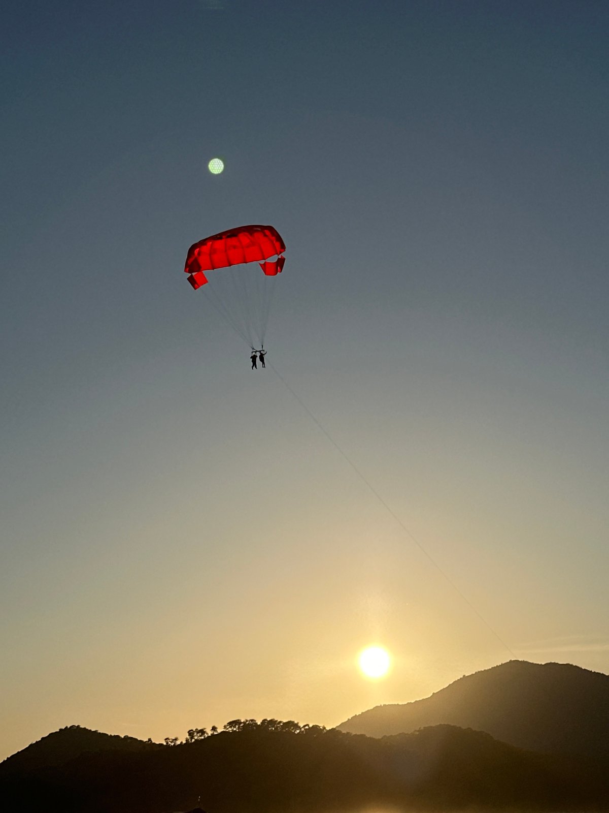 Parasailing and paragliding activities observed over Fethiye Turkey coastline