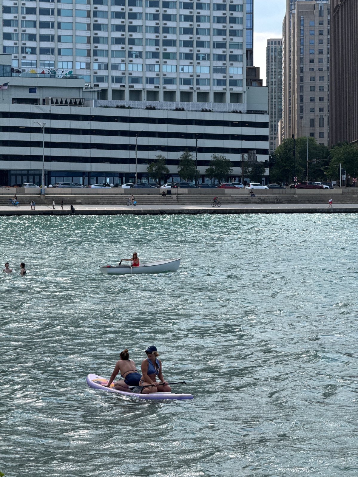 Paddleboarding on Lake Michigan with the Chicago skyline behind