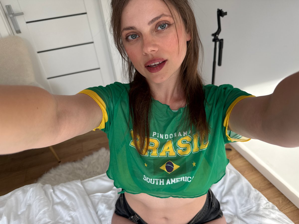 Selfie session on a bed in a Brazil t-shirt, Szklarska Poręba