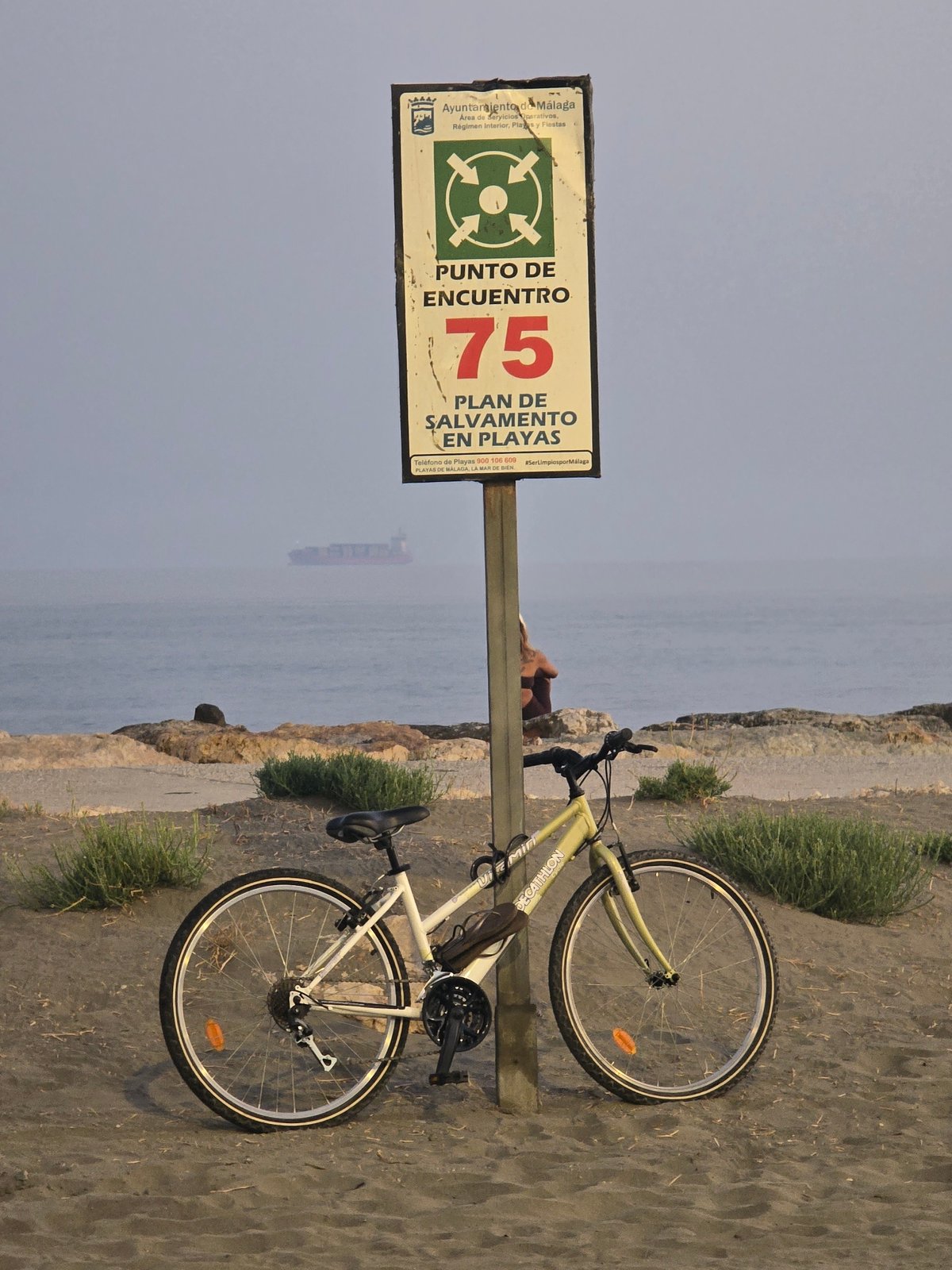 Sunset hour on Málaga's Malagueta beach, midsummer evening