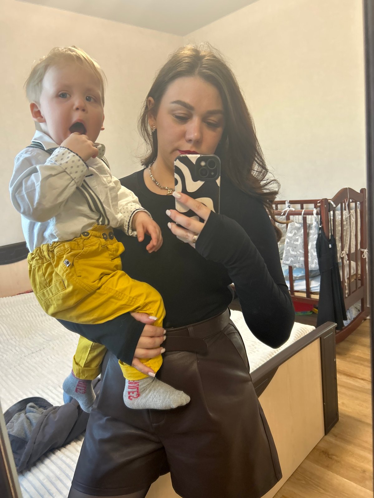 Woman takes mirror selfies in Chaikovsky, Russia