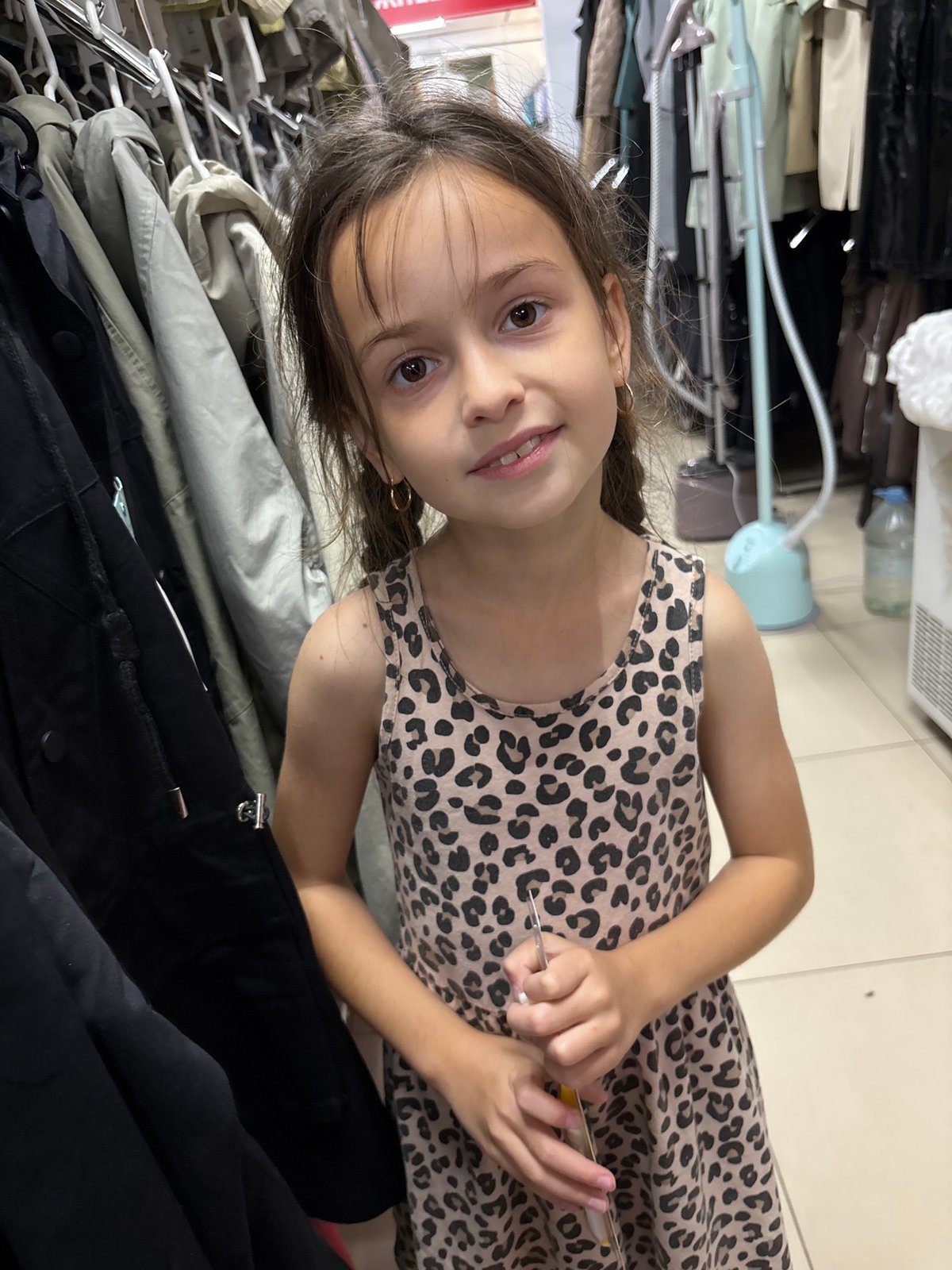 Inside a Blagoveshchensk retail store stocked with flowers and goods