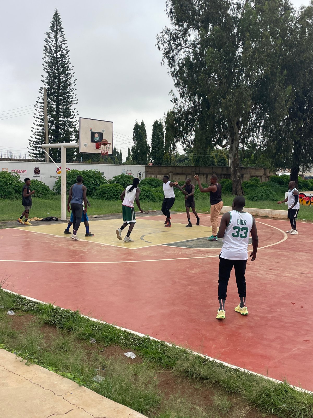 Morning street life and basketball game documented in Nigerian communities