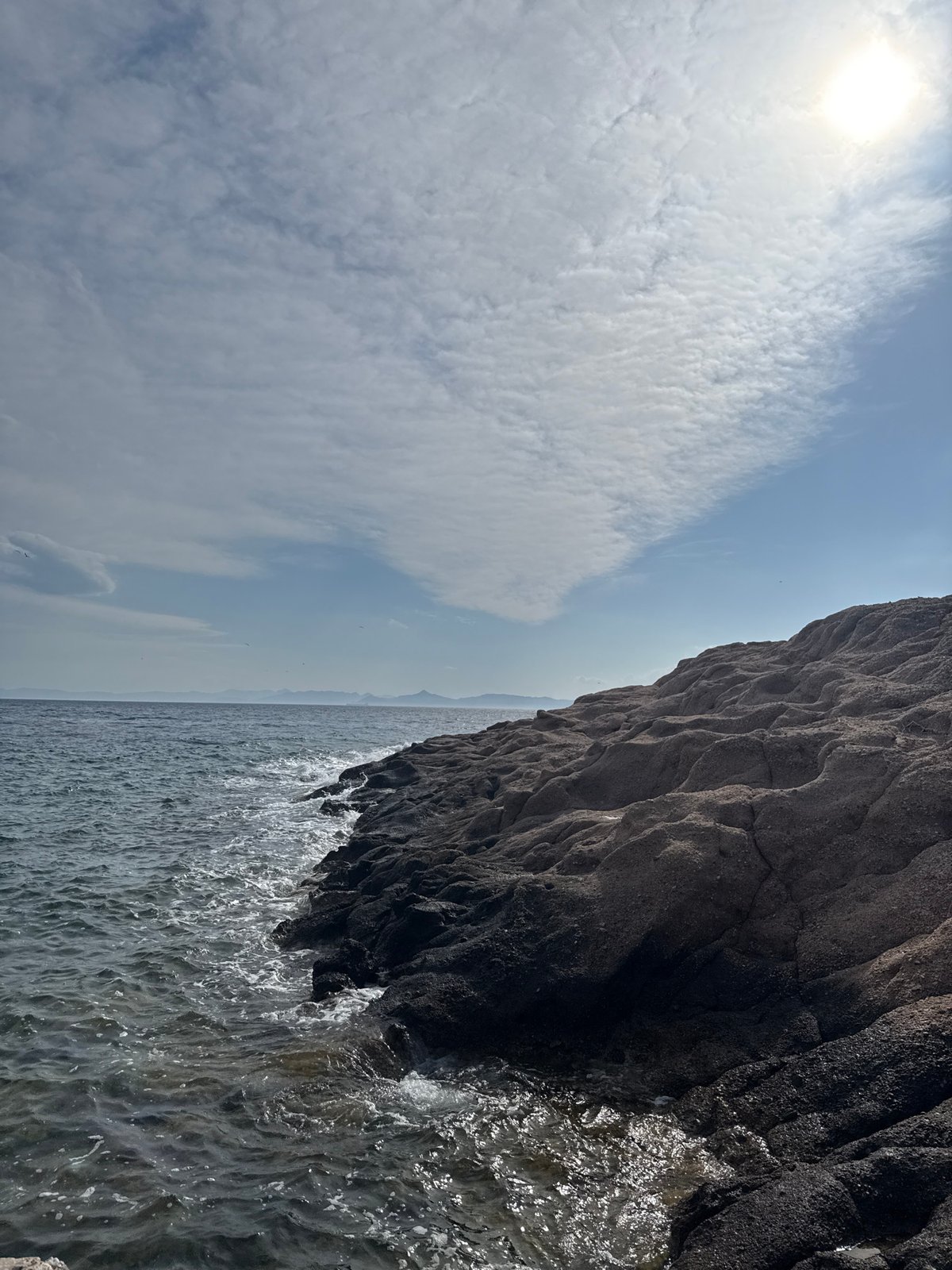 Cloudy coastal conditions observed in Vouliagmeni, Greece