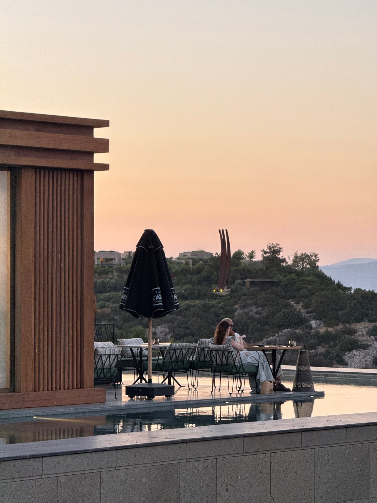 Sunset evening at Bodrum waterfront property with terrace dining