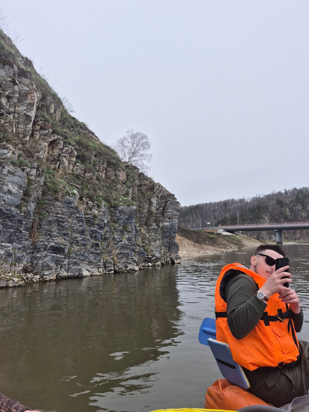 Boaters document river trip near cliffs in Новомунасипово, Russia