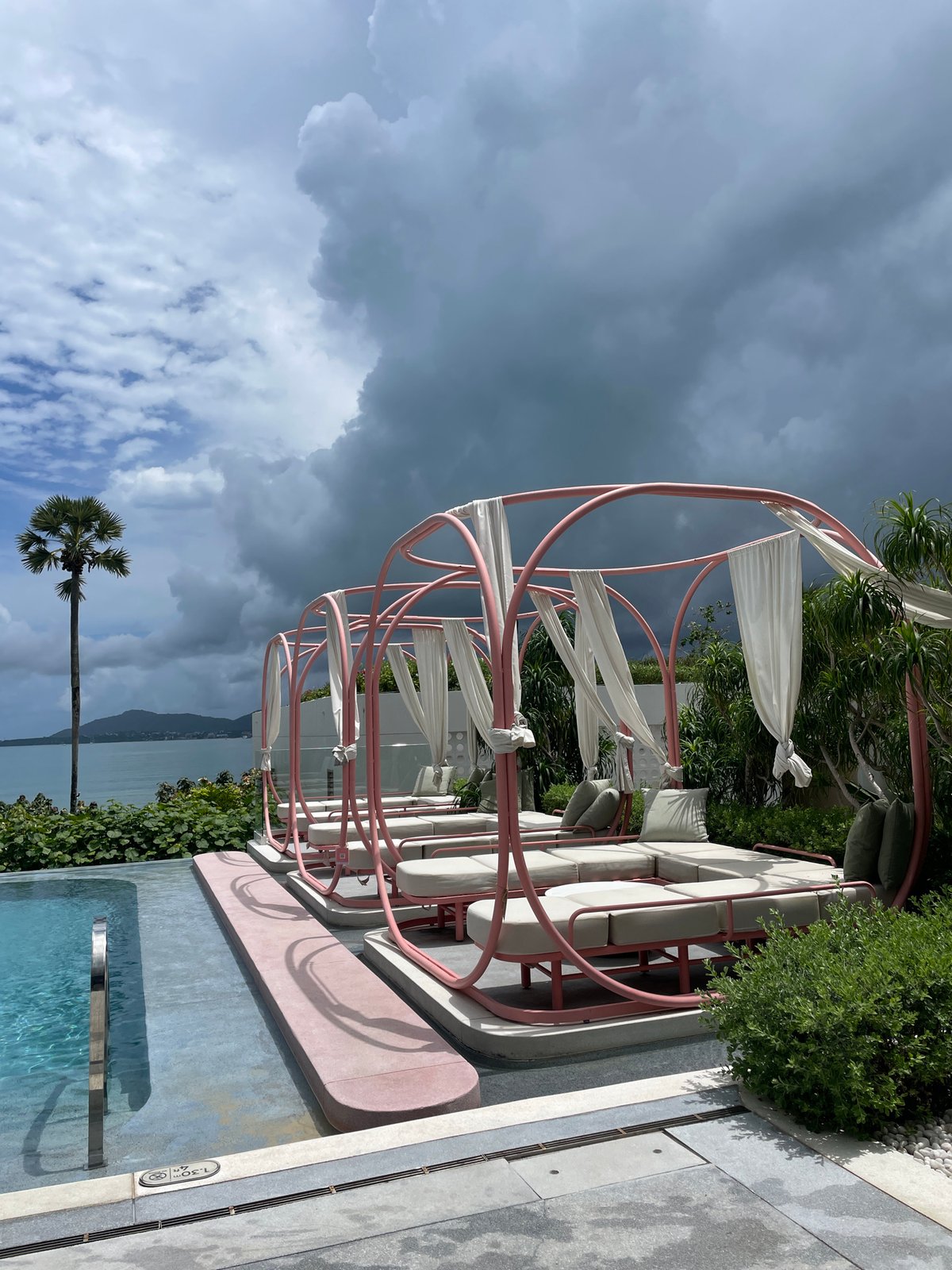 Beachside resort in Wichit, Phuket — pools, architecture, sea views