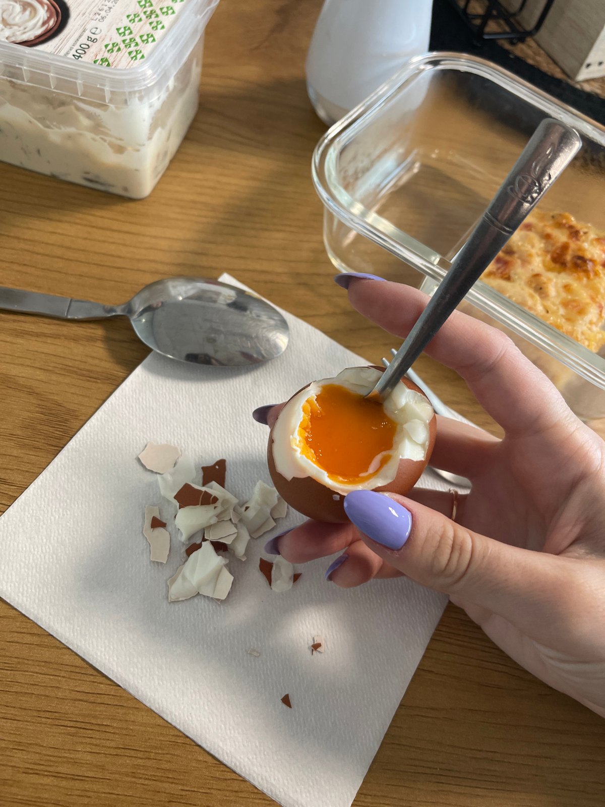 Breakfast moment captured in Sofia: soft-boiled egg preparation