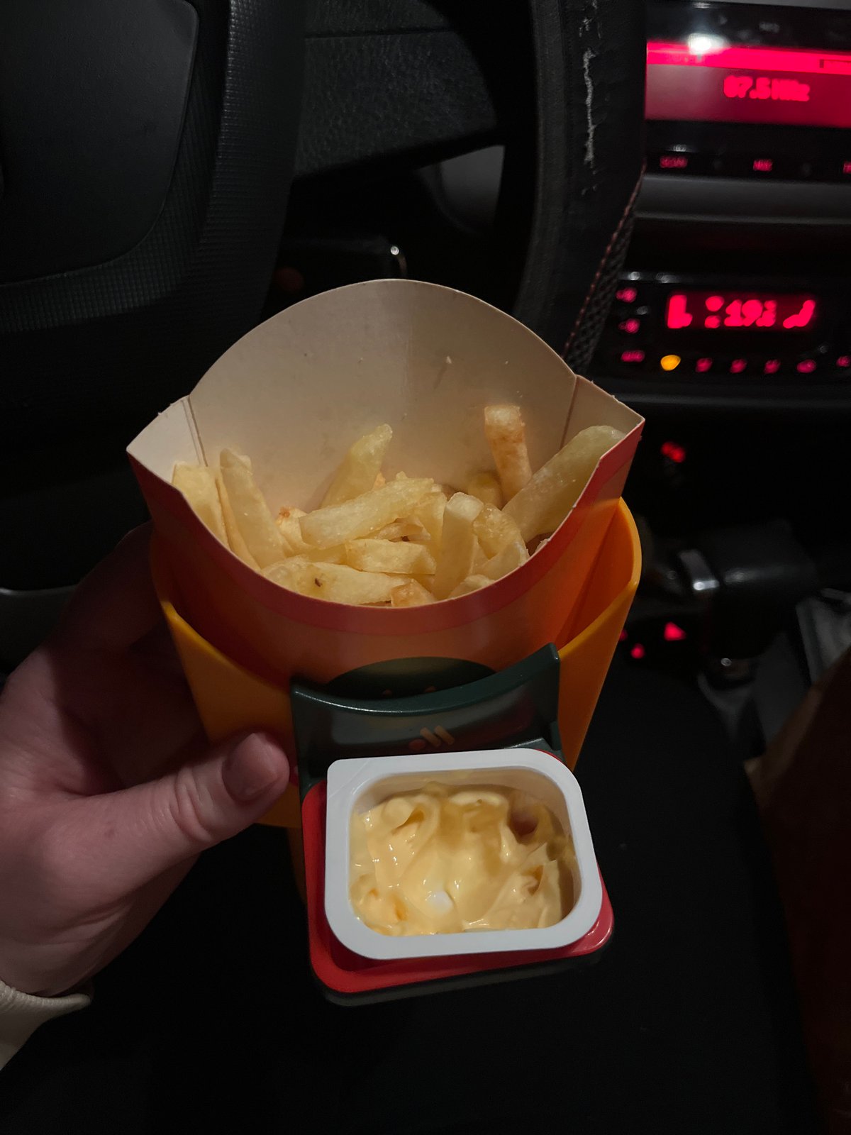 Fast food consumed in car interior, Klin Russia