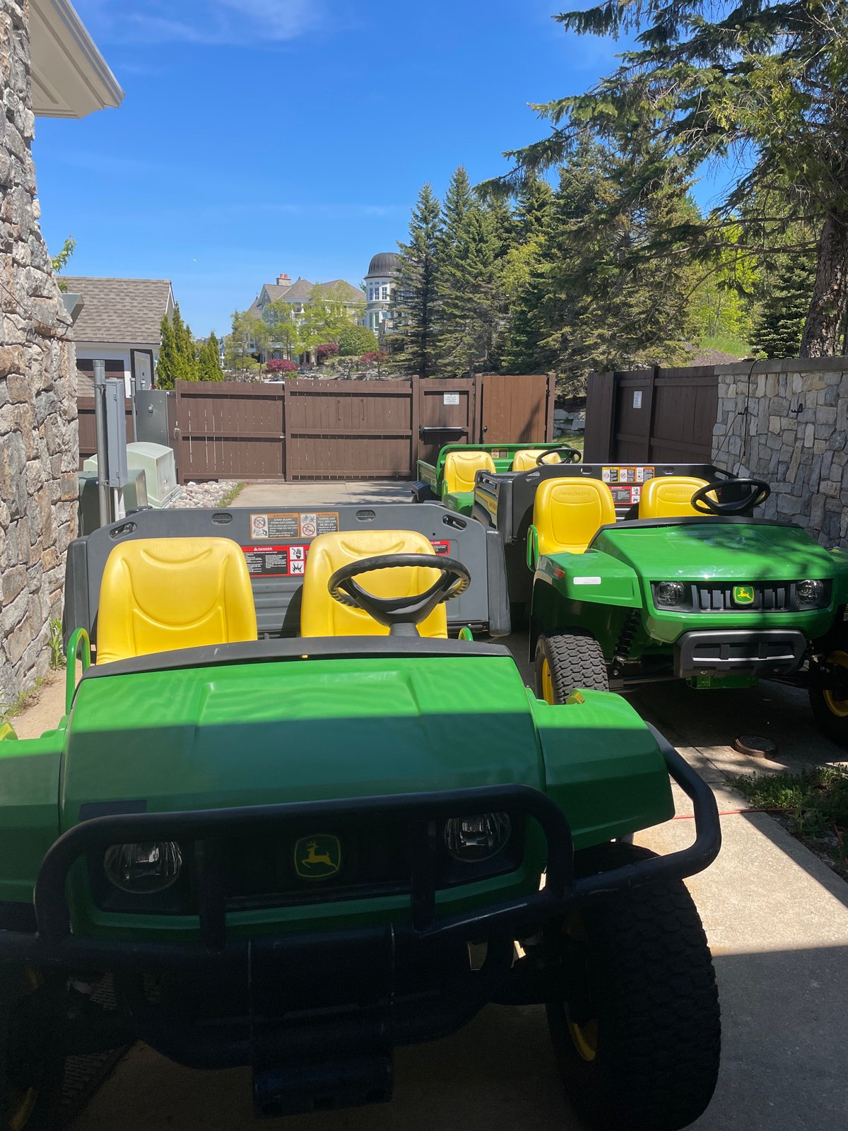 John Deere utility vehicles lined up in Petoskey