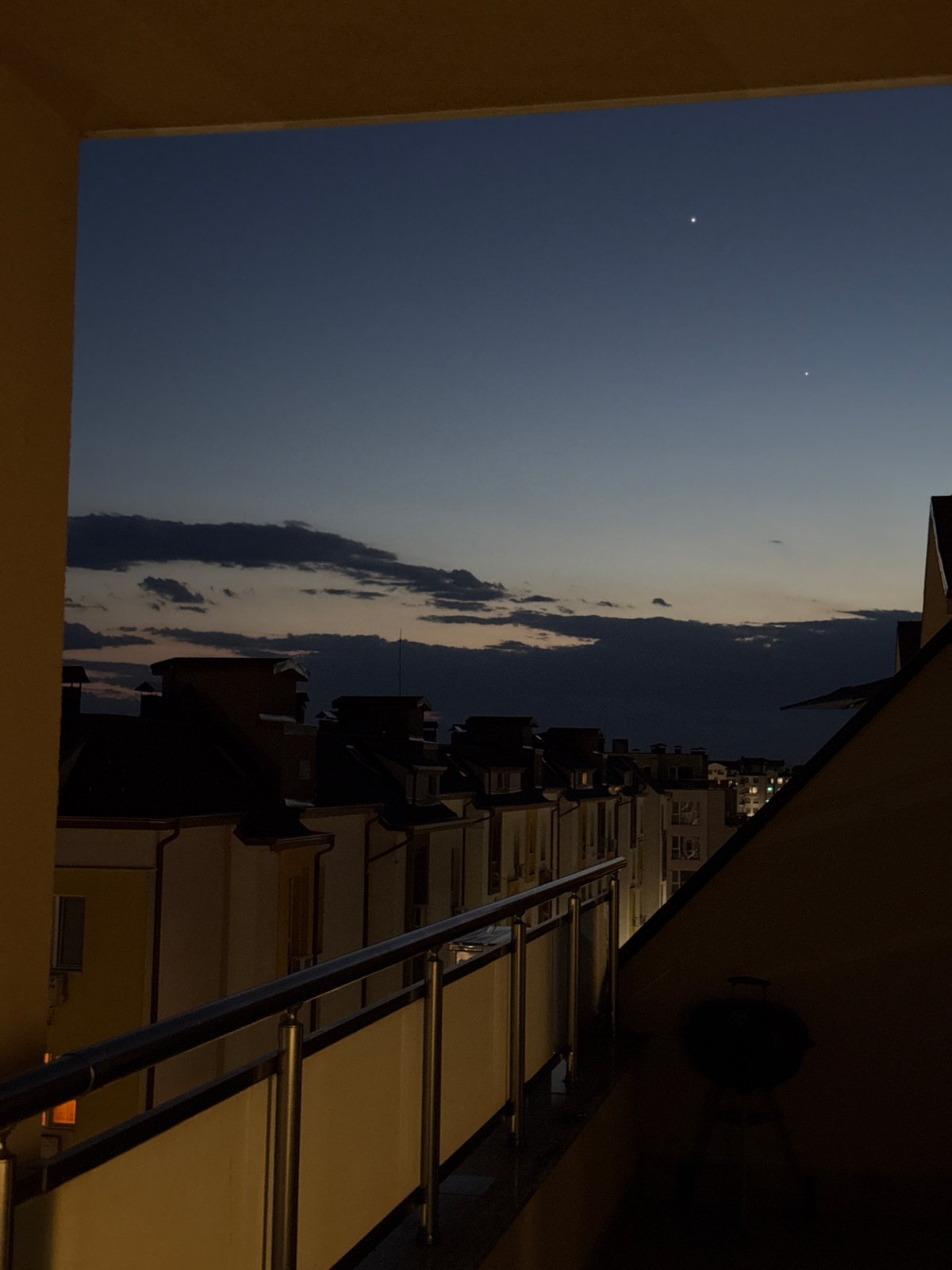 Evening in Plovdiv — balconies, sidewalks, and home workouts
