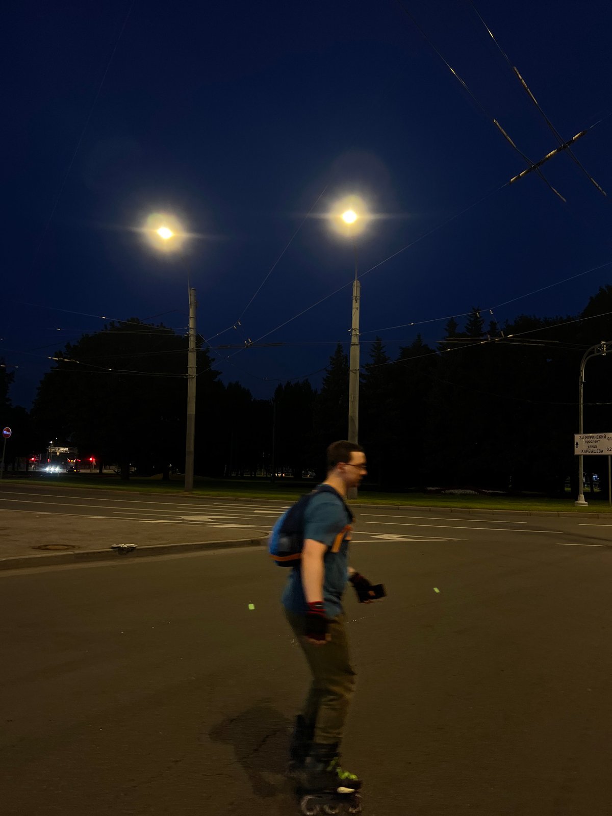 Evening street life documented across Saint Petersburg districts