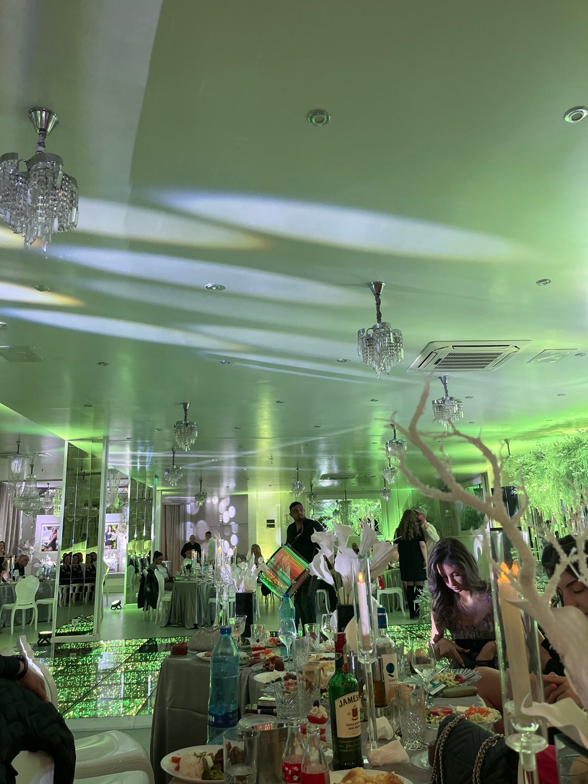 Formal event with indoor dining, outdoor space documented in Bulgaria