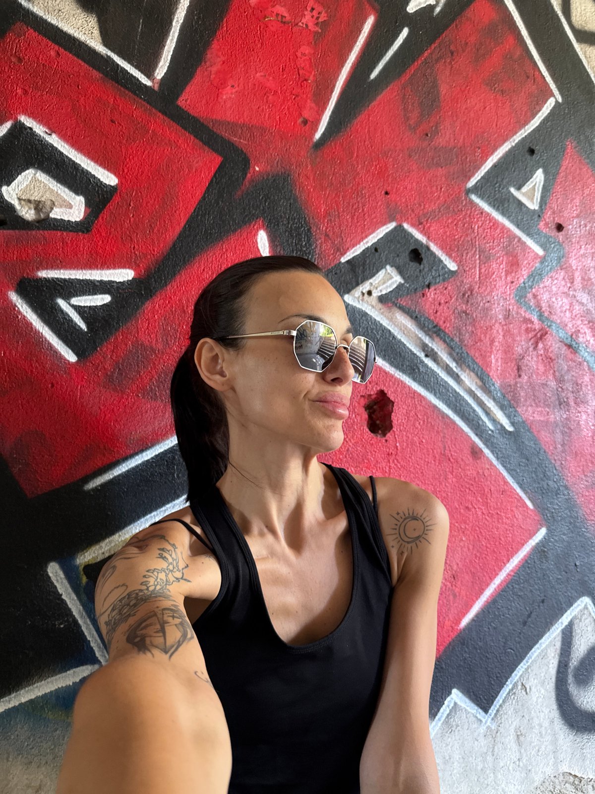 Woman captures morning selfies in downtown Pleven, Bulgaria