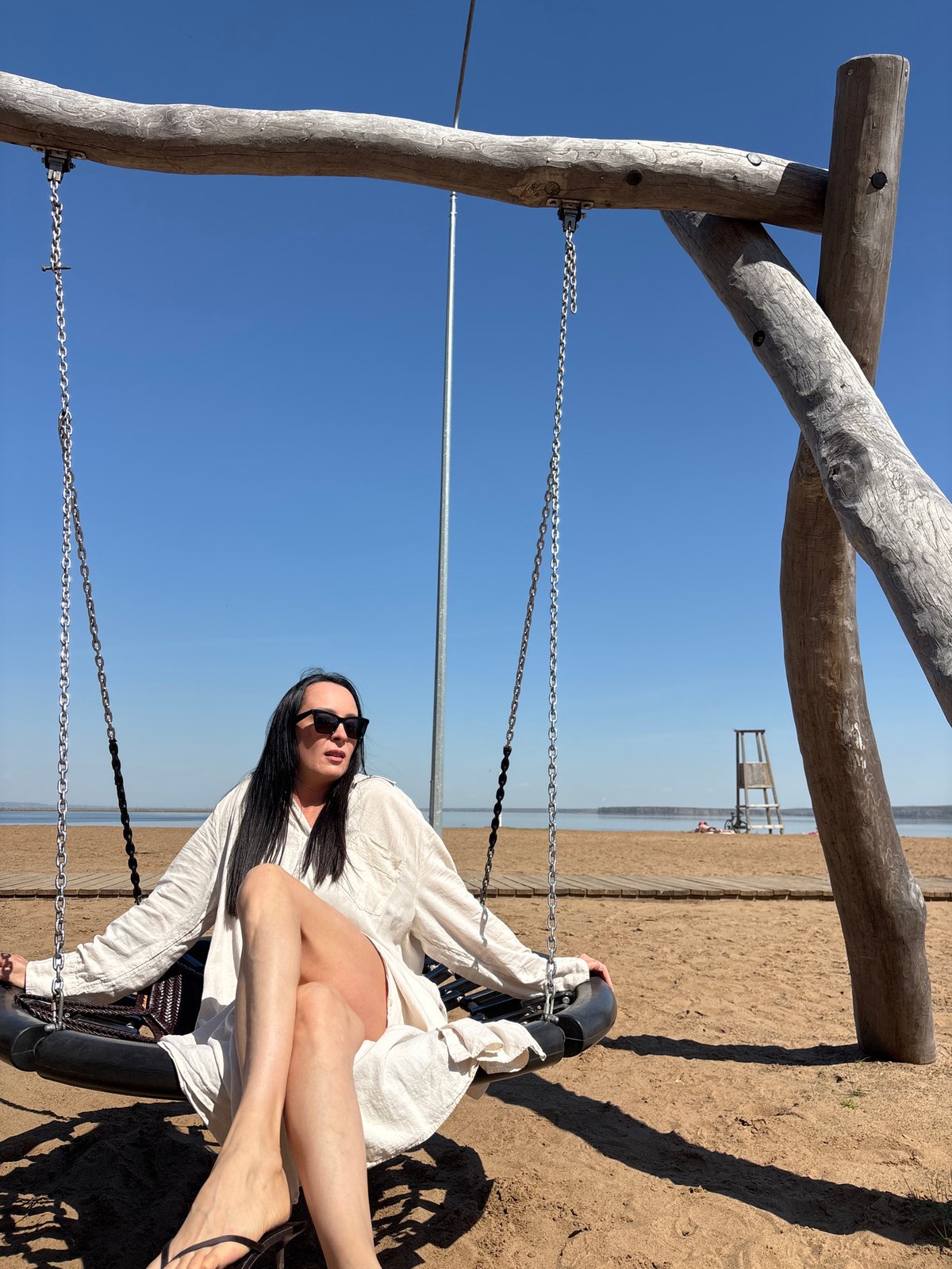 Morning beach relaxation captured in Chaikovsky, Russia