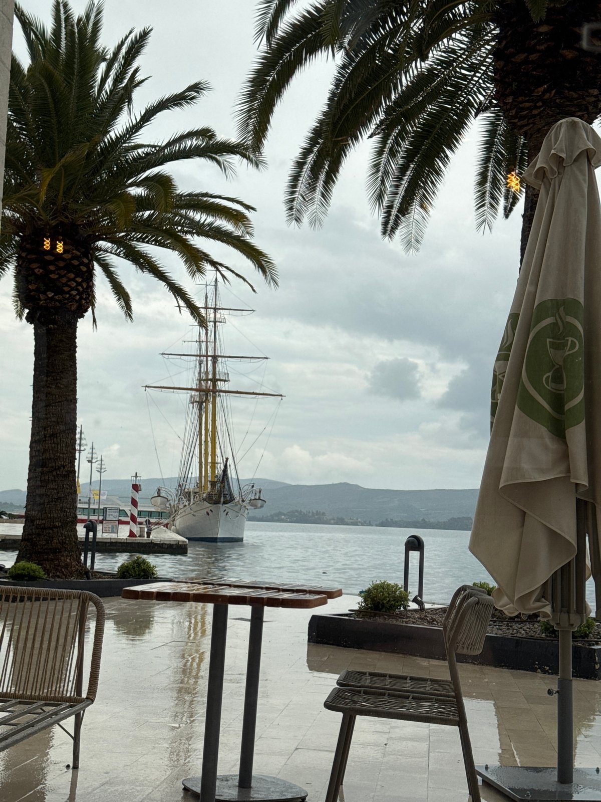Luxury yachts observed at Tivat marina under overcast skies