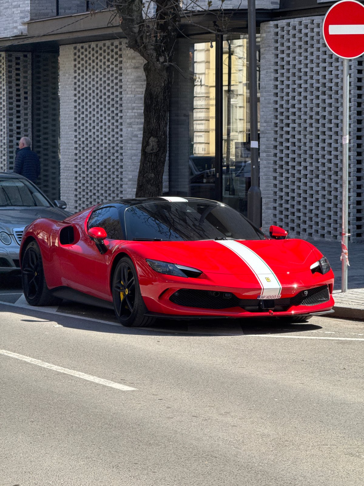 Red Ferrari SF90 spotted parked on Sofia street