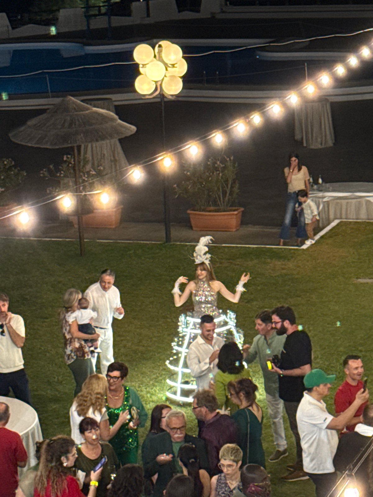 Evening wedding reception held outdoors in Isola delle Femmine
