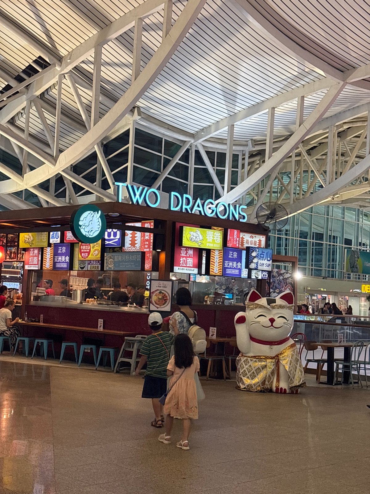Bilingual restaurant documented at Indonesian airport terminal