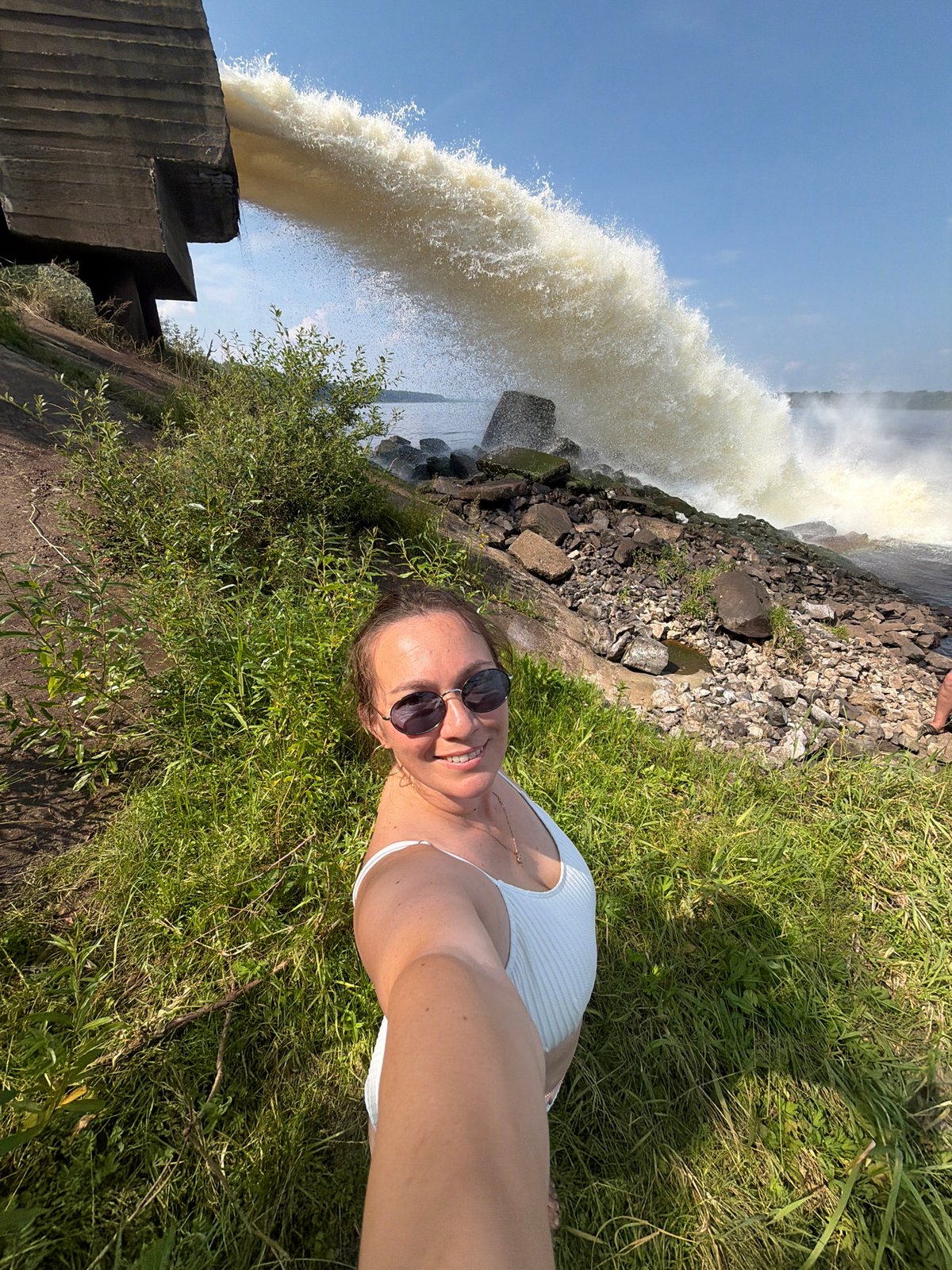 Selfies at a roaring water release structure in Chernushka