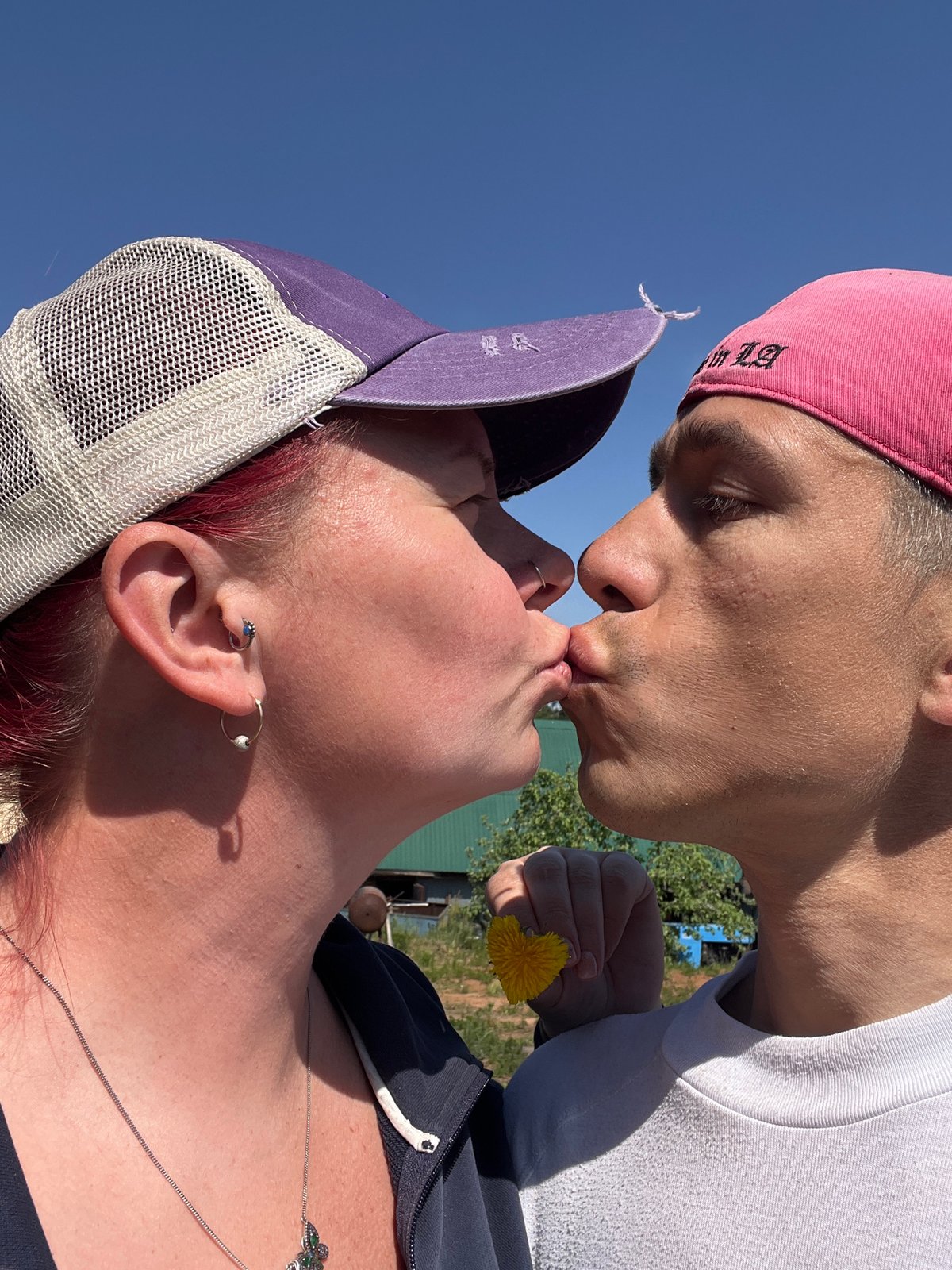 Couple shares romantic moment with dandelion in Chaikovsky, Russia