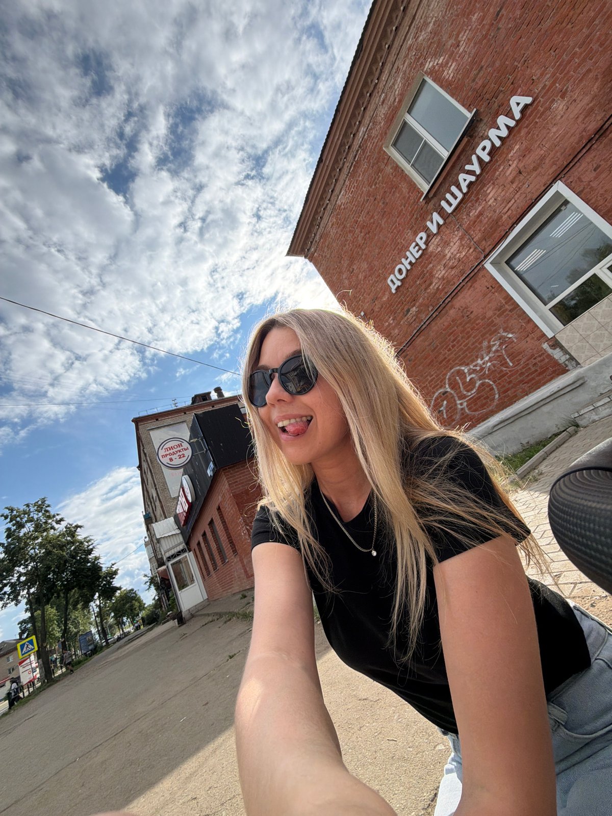 Woman and baby enjoy afternoon outing in Chaikovsky, Russia