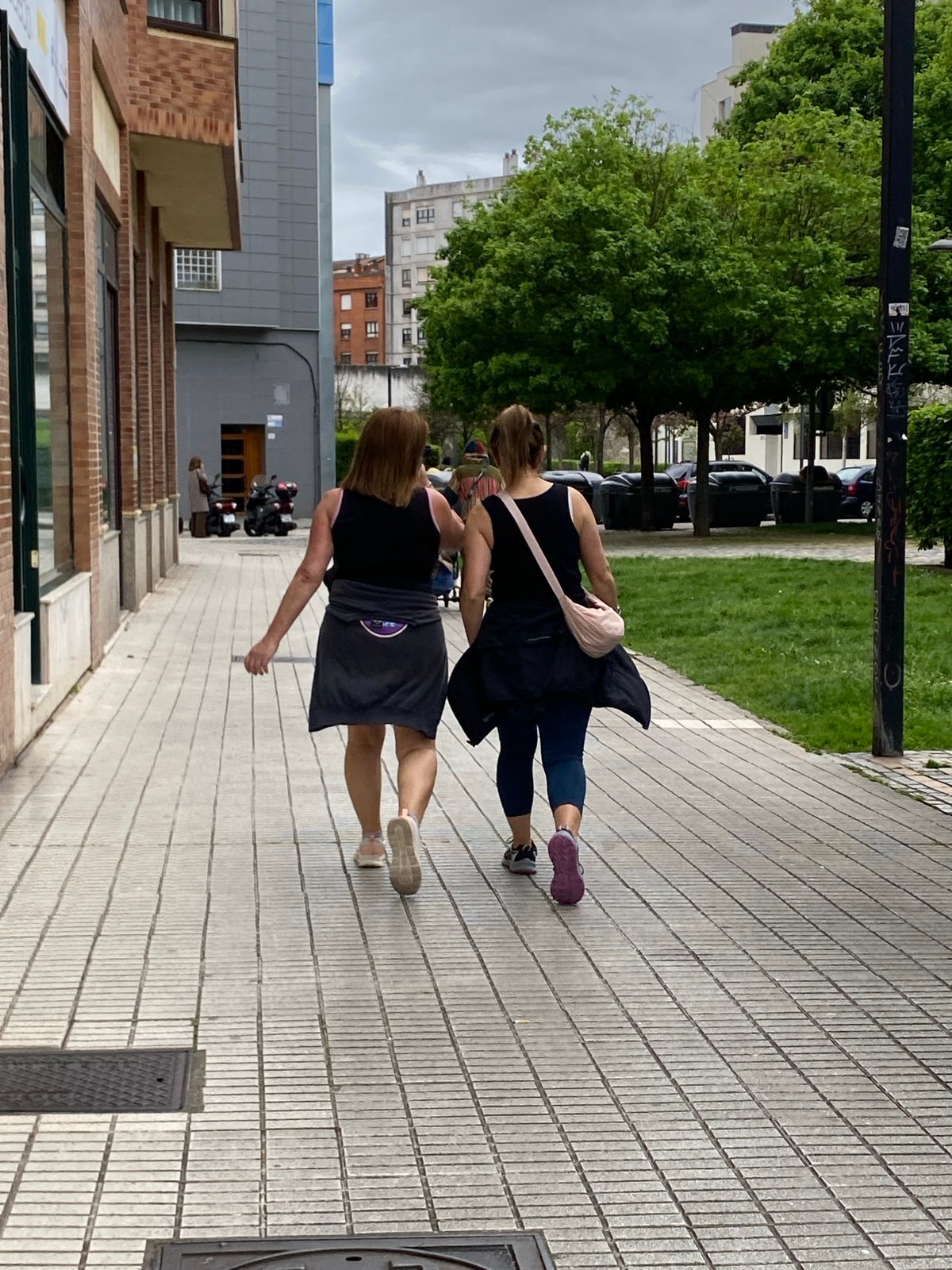 Person documents routine afternoon in coastal Gijón, Spain