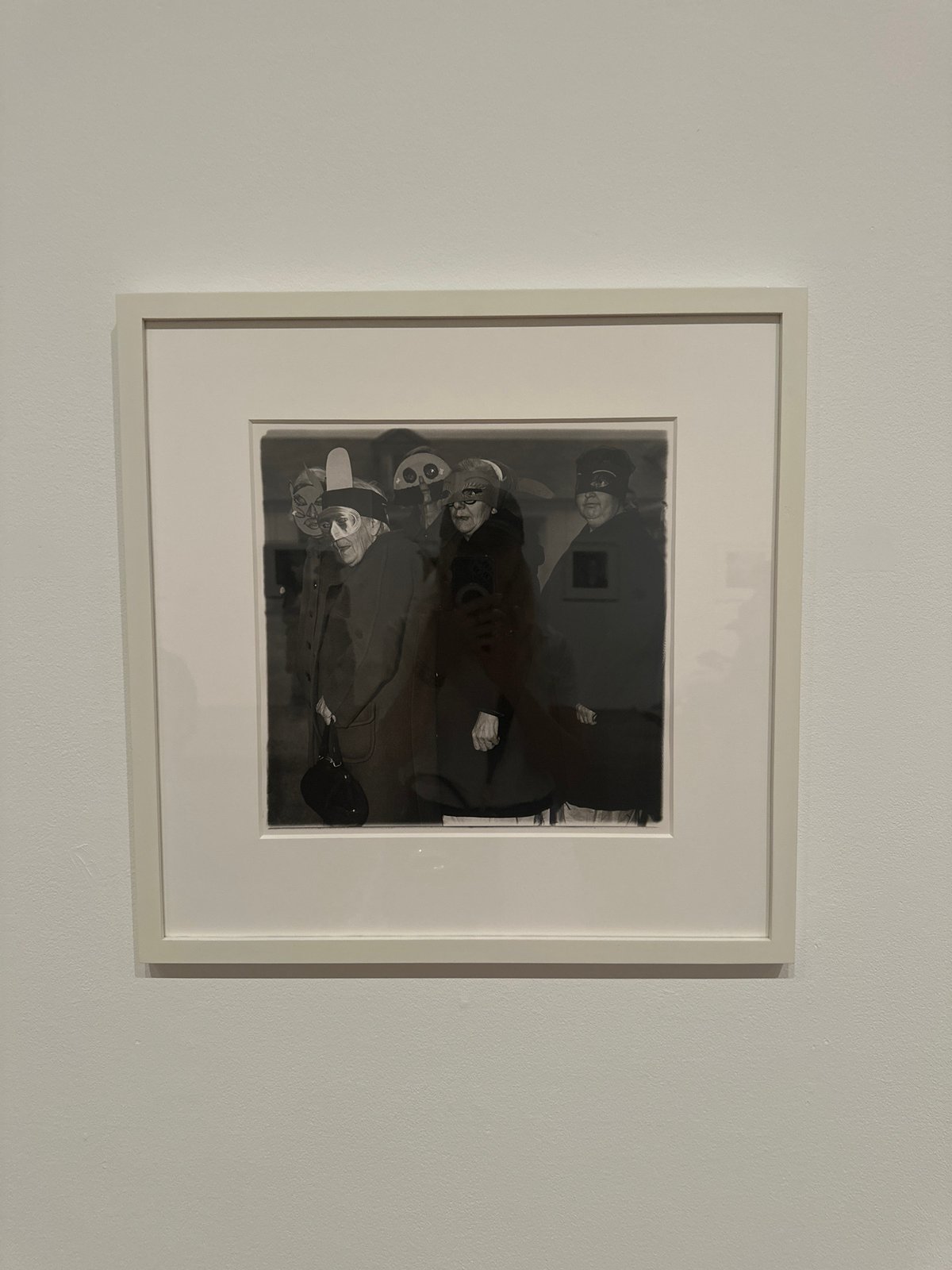 Mixed-media art exhibition with photography, abstraction, and textile works