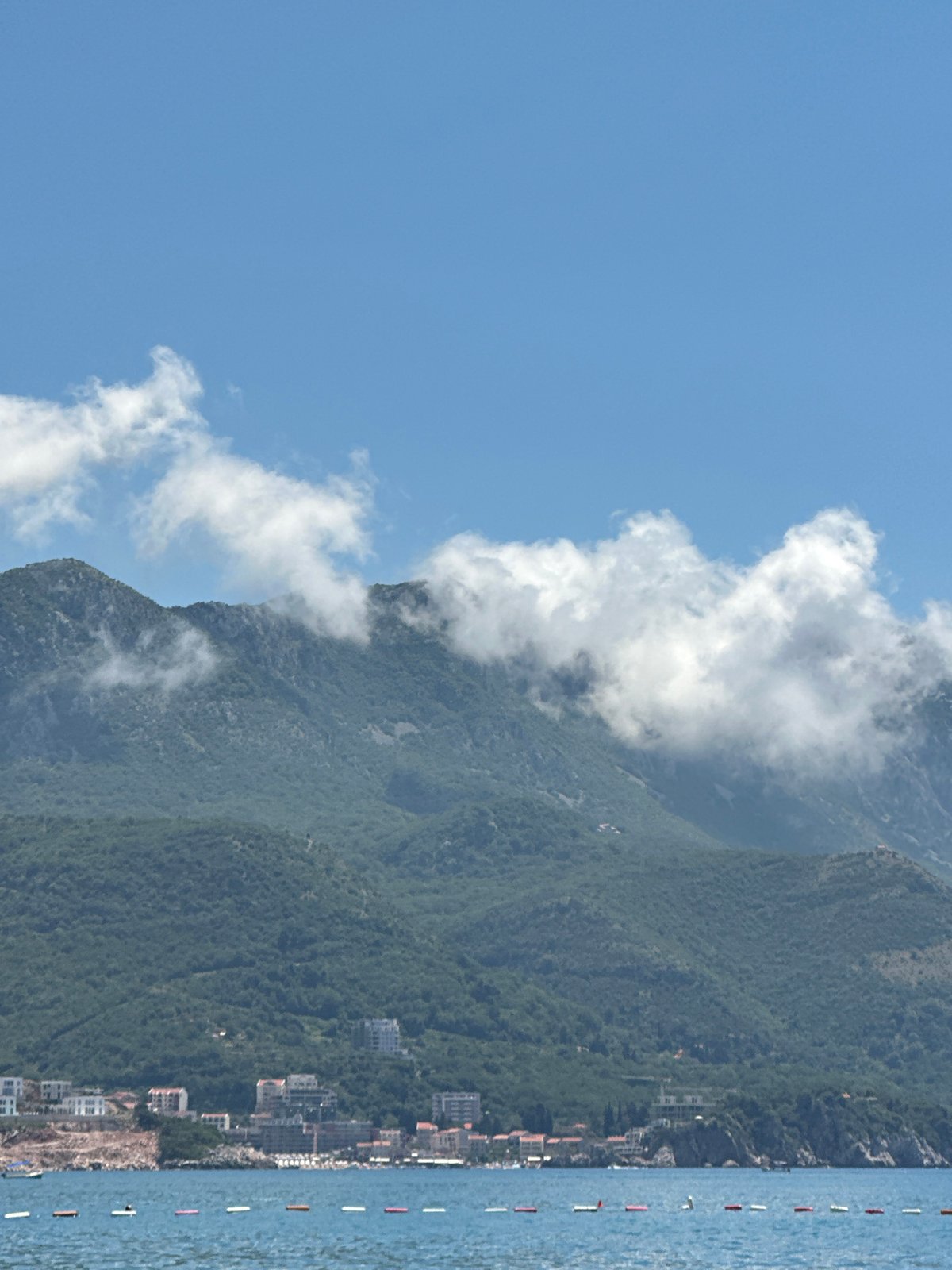 Parasailing and beach activity along the Boreti coastline