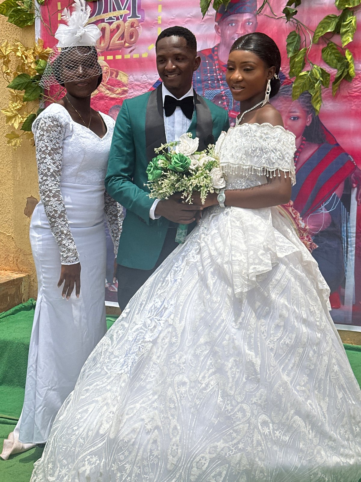 Church wedding ceremony features traditional processional with candles