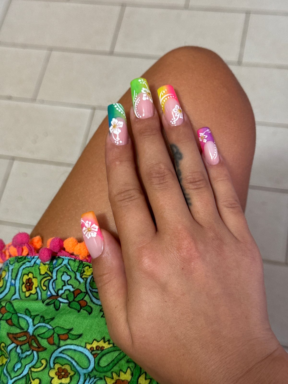 French Bulldogs and rainbow nails at home in coastal Italy