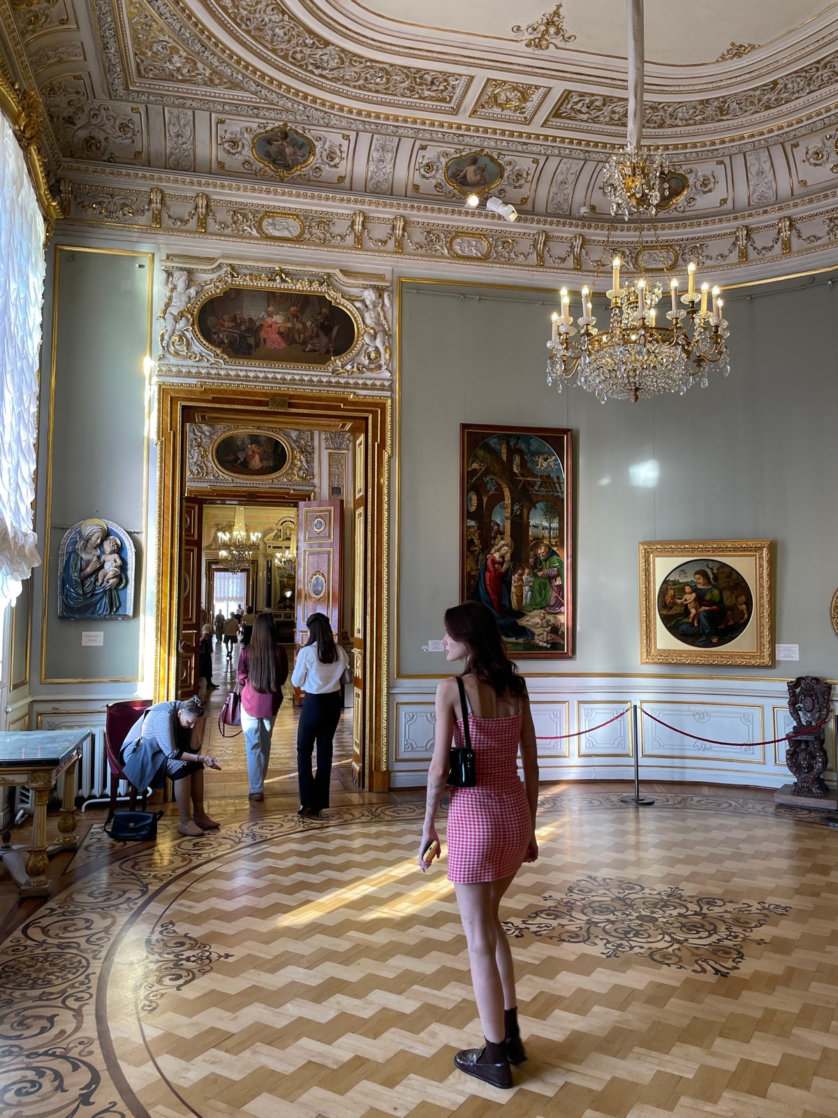 Tourist documents afternoon walk through historic Saint Petersburg landmarks