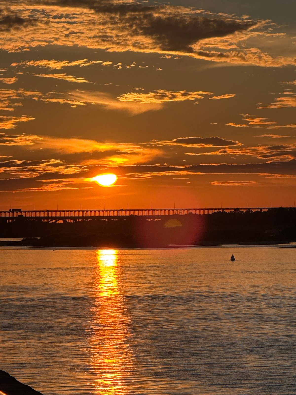 Volga River sunset frames arched bridge in Nizhny Novgorod