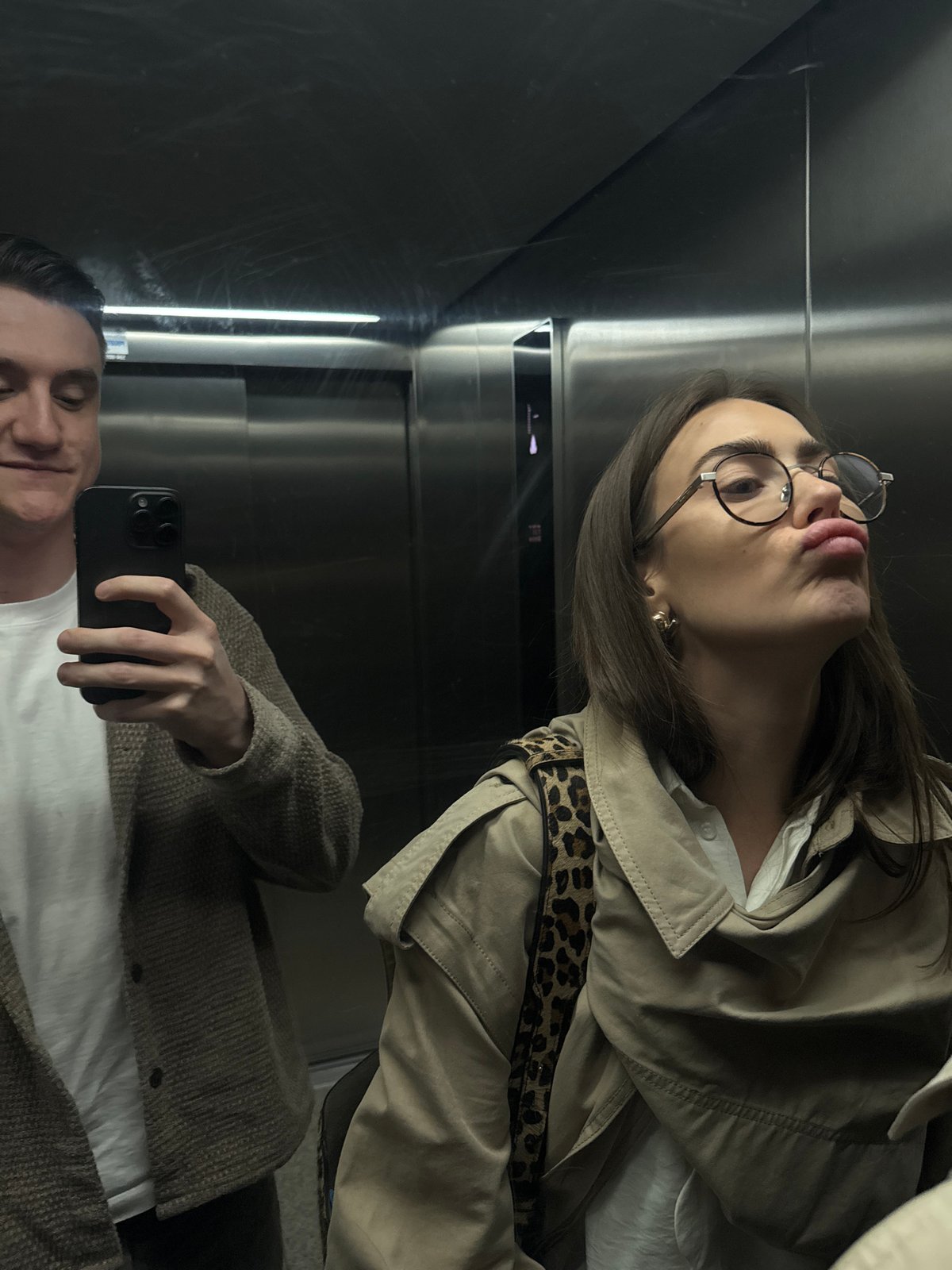 Woman in trench coat photographed in multiple interior locations