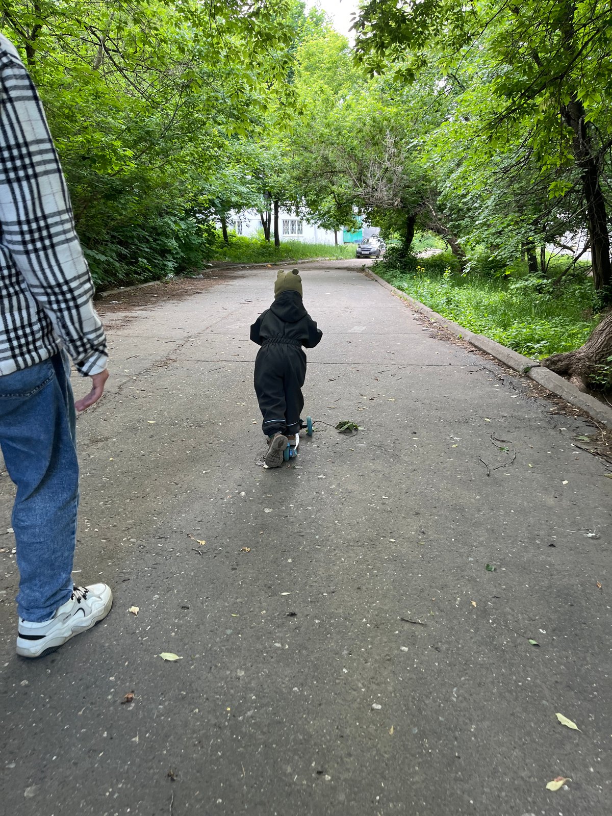 Family documents toddler's playground visit and pet play in Chaikovsky