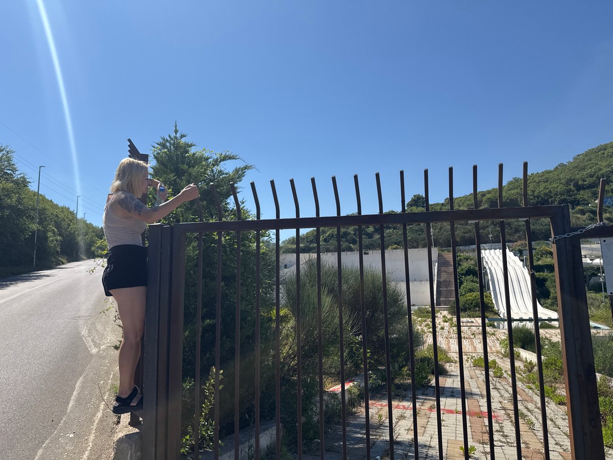 Woman visits abandoned Top Hill water park in Montenegro