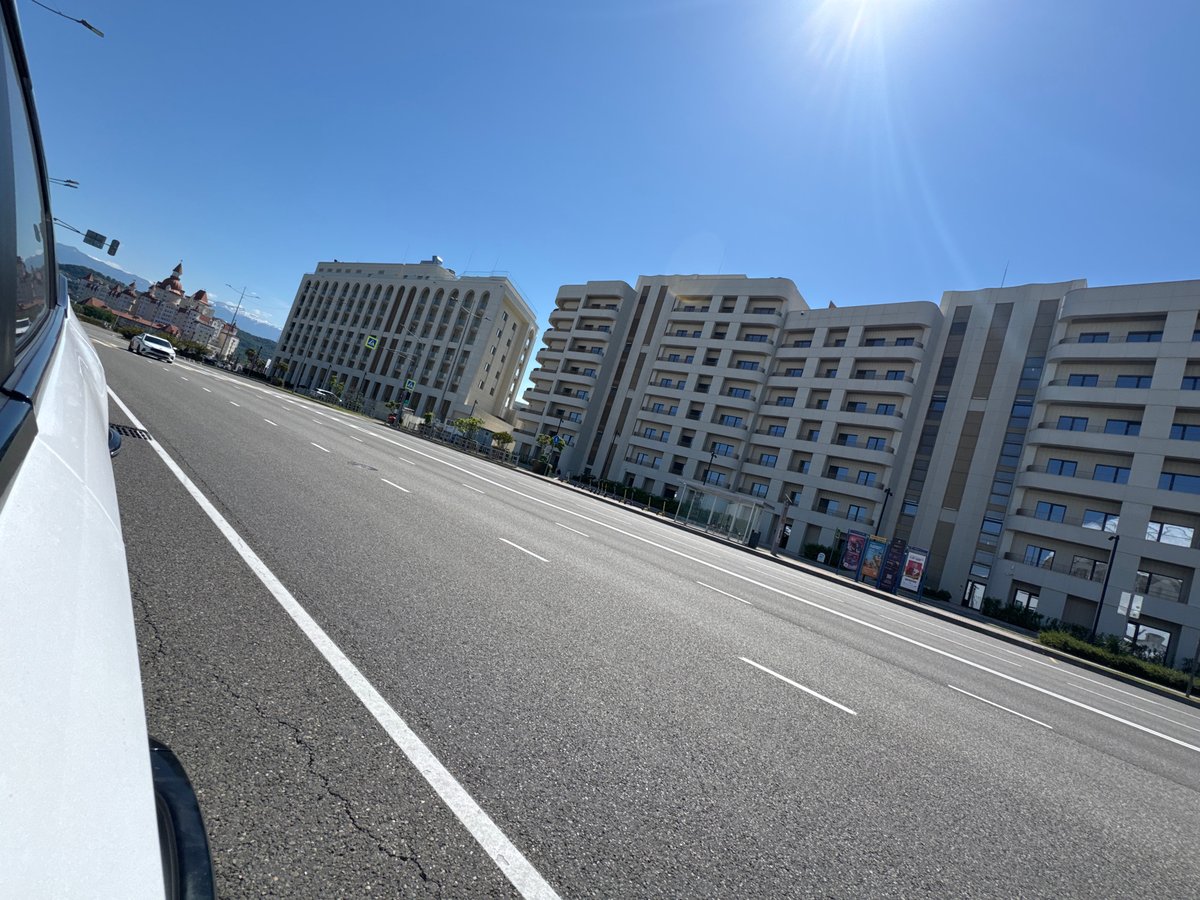 Morning road and digital display documented in Sirius, Russia