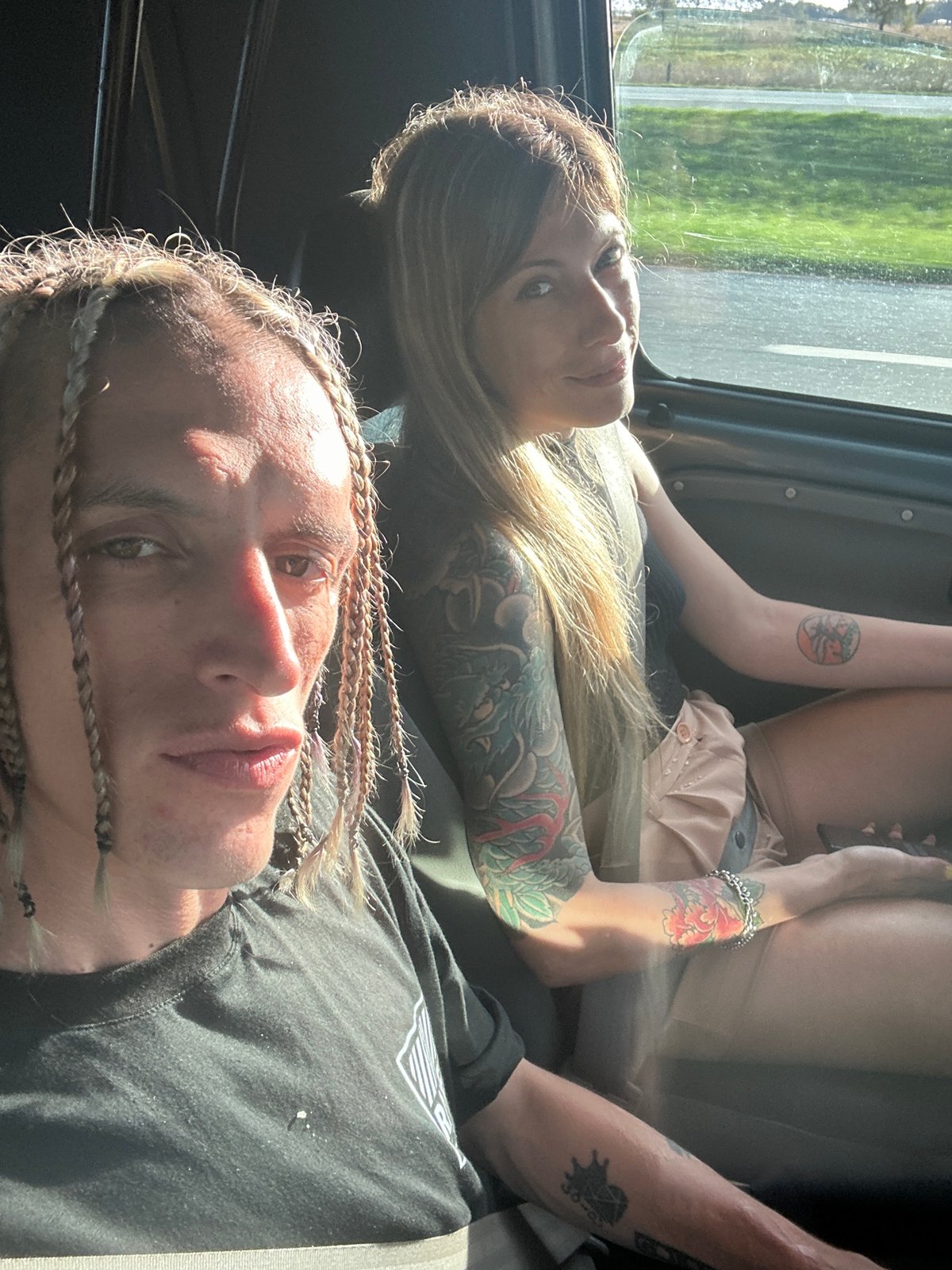 Two people rest inside vehicle in Argentina