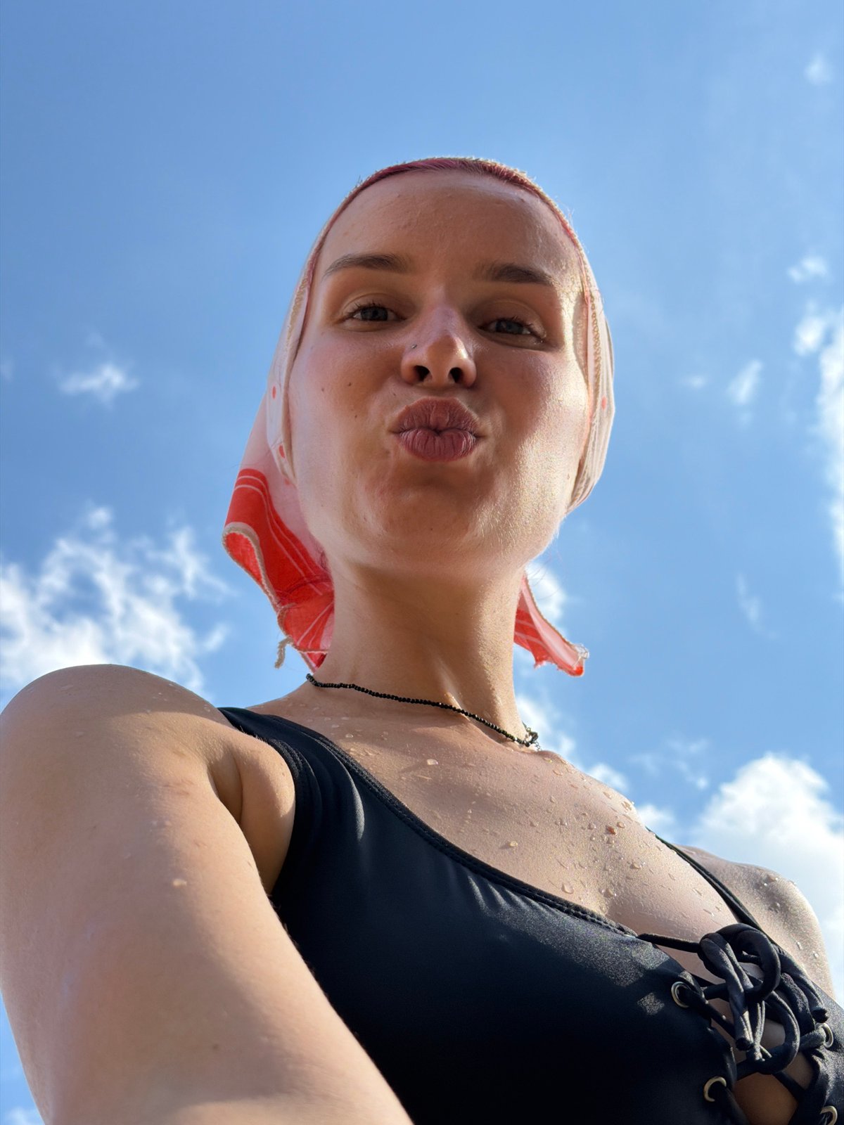 Summer day in Chaikovsky: swimwear, pansies, and sleeping cats