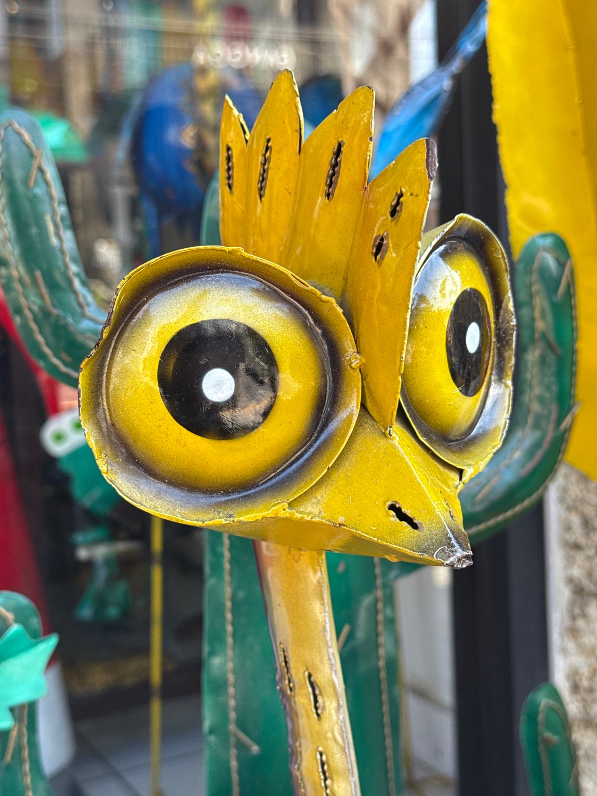Tourist shops in Ubud showcase colorful handicrafts and decorative sculptures